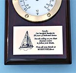 Engraved brass plaque on clock thermometer plaque